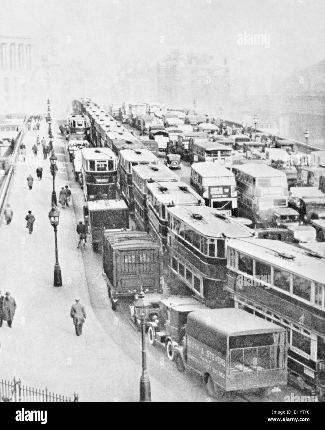 Traffic Jam on Blackfriars Bridge, London, c1935. Artist: George Davison Reid Stock Photo
