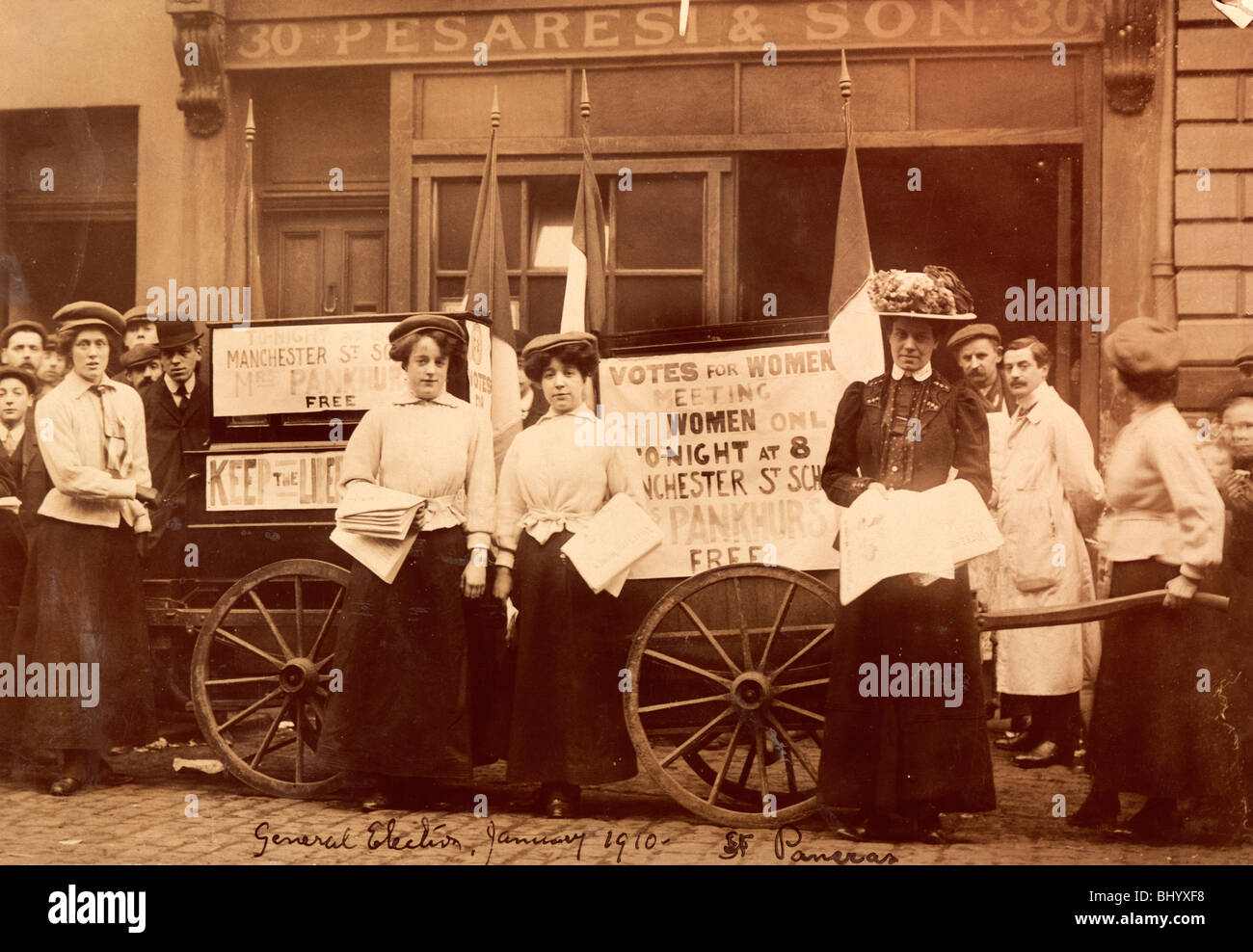 Suffragettes advertising a talk by Emmeline Pankhurst, St Pancras, London, 1910. Artist: Unknown Stock Photo