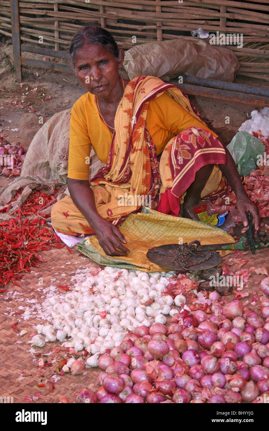 Indian Woman Selling Onions And Chilis In Kotogada, Orissa Stock Photo