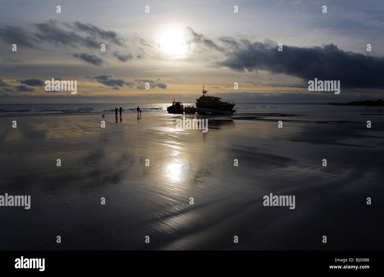 Early dawn Lifeboat Launch by Tractor, Clogher Head, County Louth, Ireland Stock Photo
