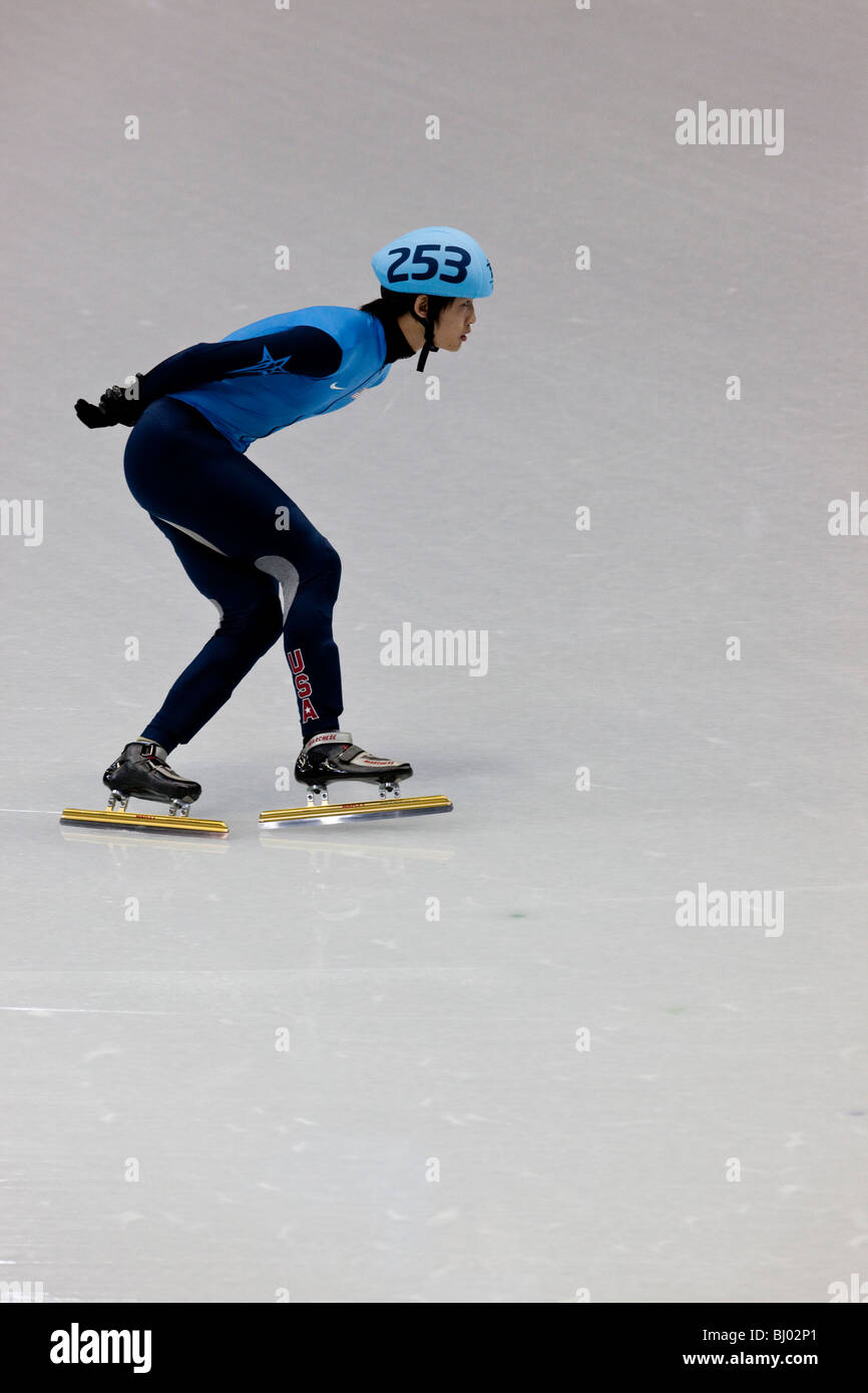 Simon Cho (USA) competing in the Short Track Speed Skating Men's 500m event at the 2010 Olympic Winter Game Stock Photo