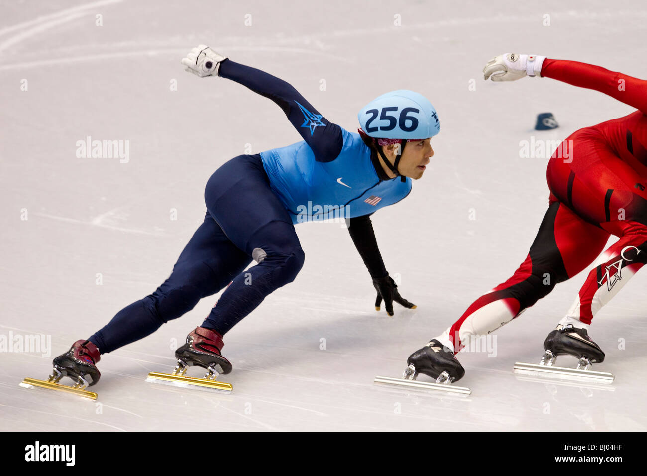 Apolo Anton Ohno (USA) competing in the Short Track Speed Skating Men's 500m event at the 2010 Olympic Winter Games Stock Photo