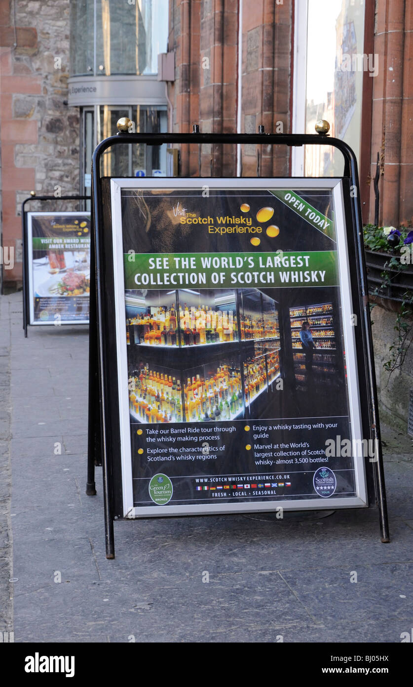 Boards advertising the Scotch Whisky Experience on the Royal Mile, Edinburgh, Scotland, UK. Stock Photo