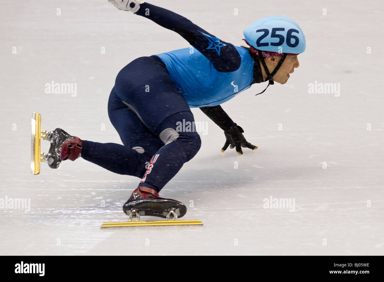 Apolo Anton Ohno (USA) competing in the Short Track Speed Skating Men's 500m event at the 2010 Olympic Winter Games Stock Photo