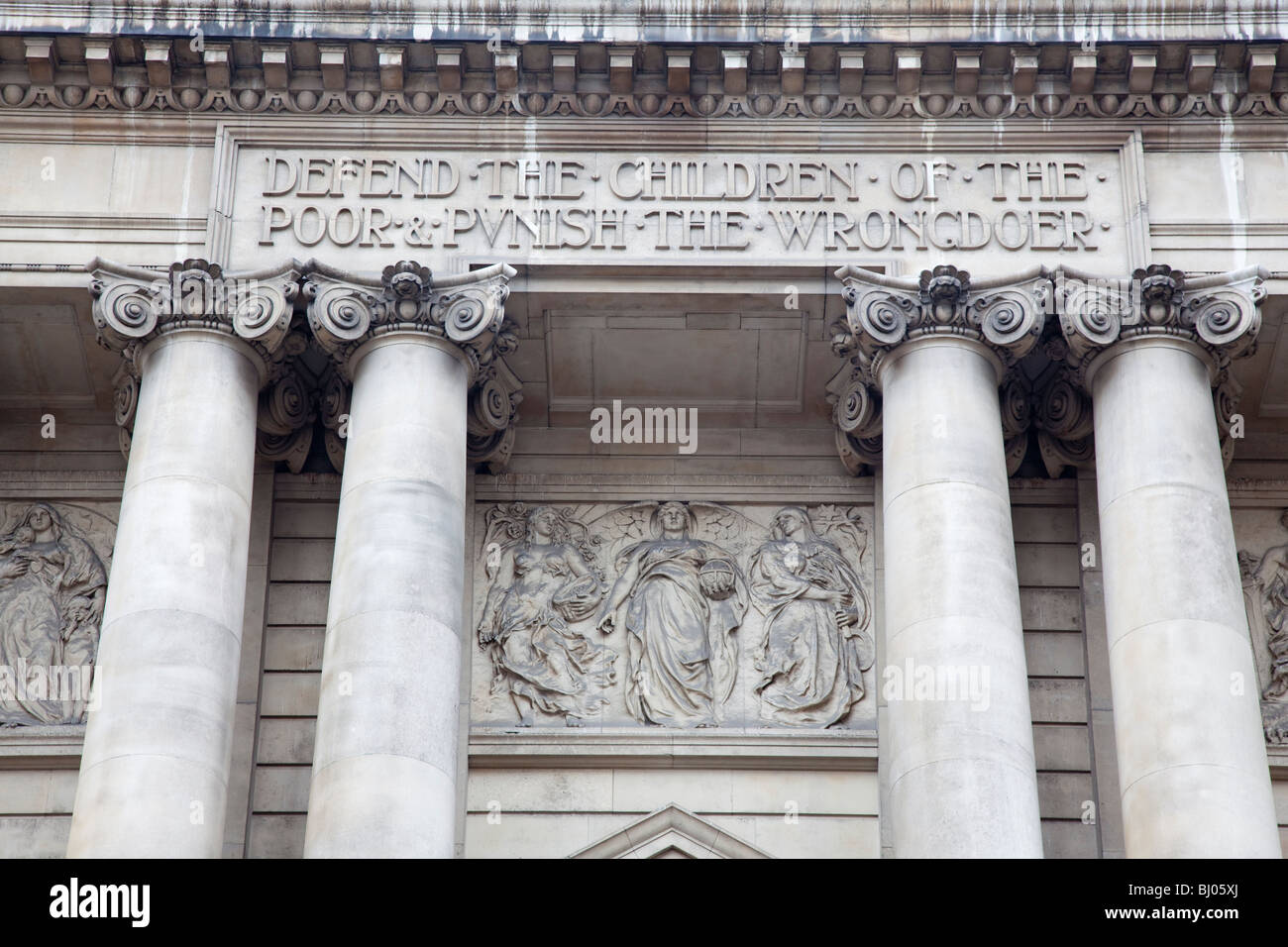 Detail from above the entrance to the Central Criminal Courts or Old Bailey London UK Stock Photo