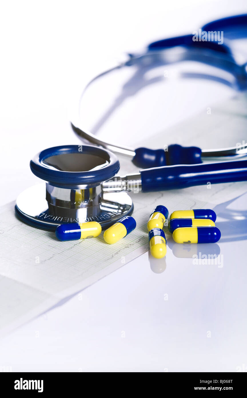 stethoscope, pills and ekg isolated on white background Stock Photo