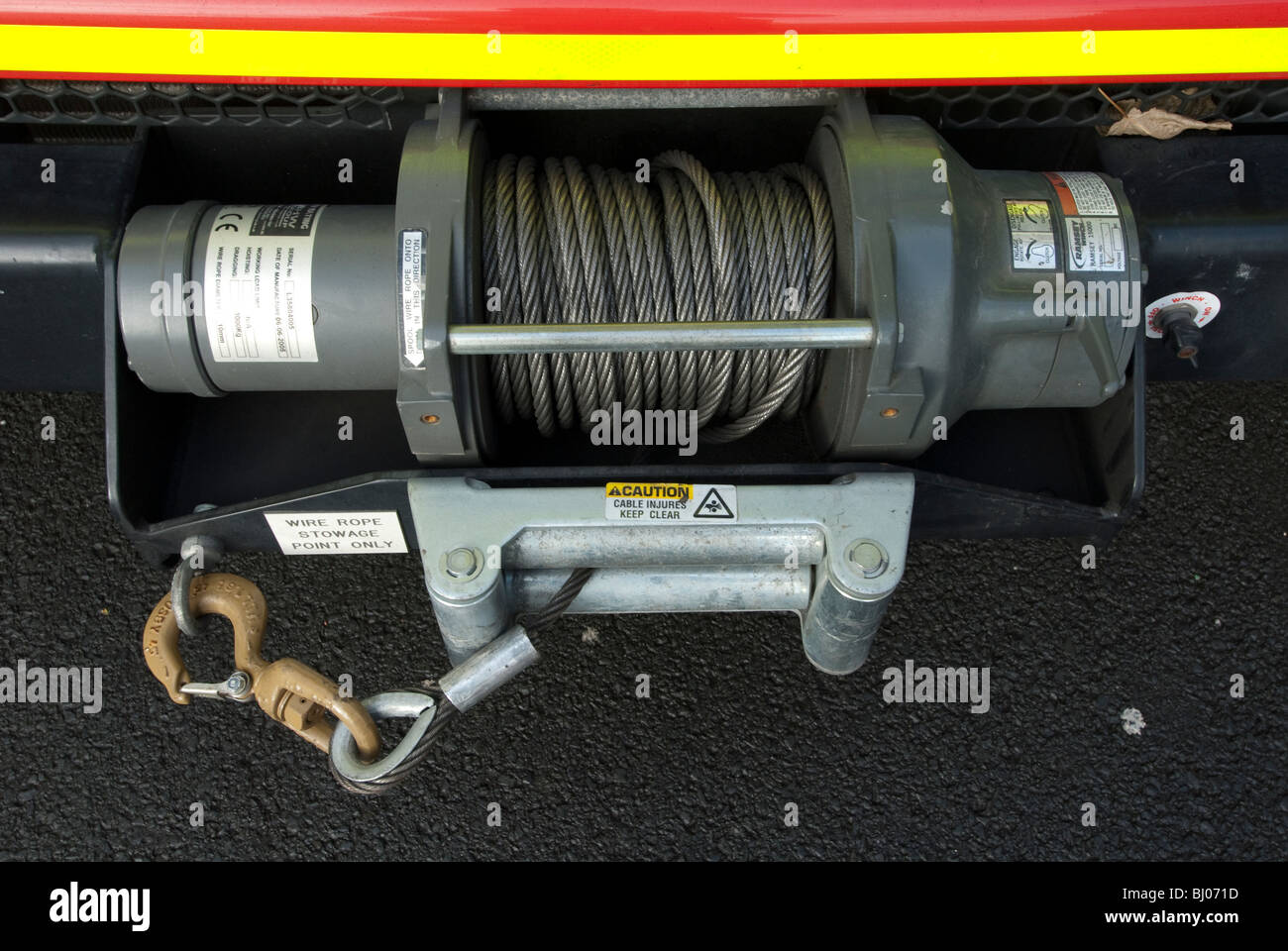 Electric winch and steel cable on fire engine Stock Photo