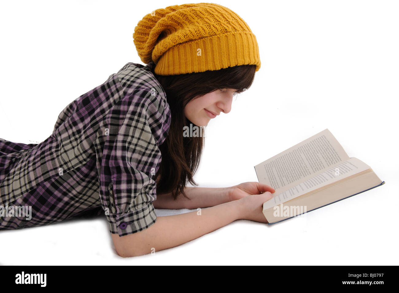 teenage girl reading a book isolated on white, cutout Stock Photo - Alamy