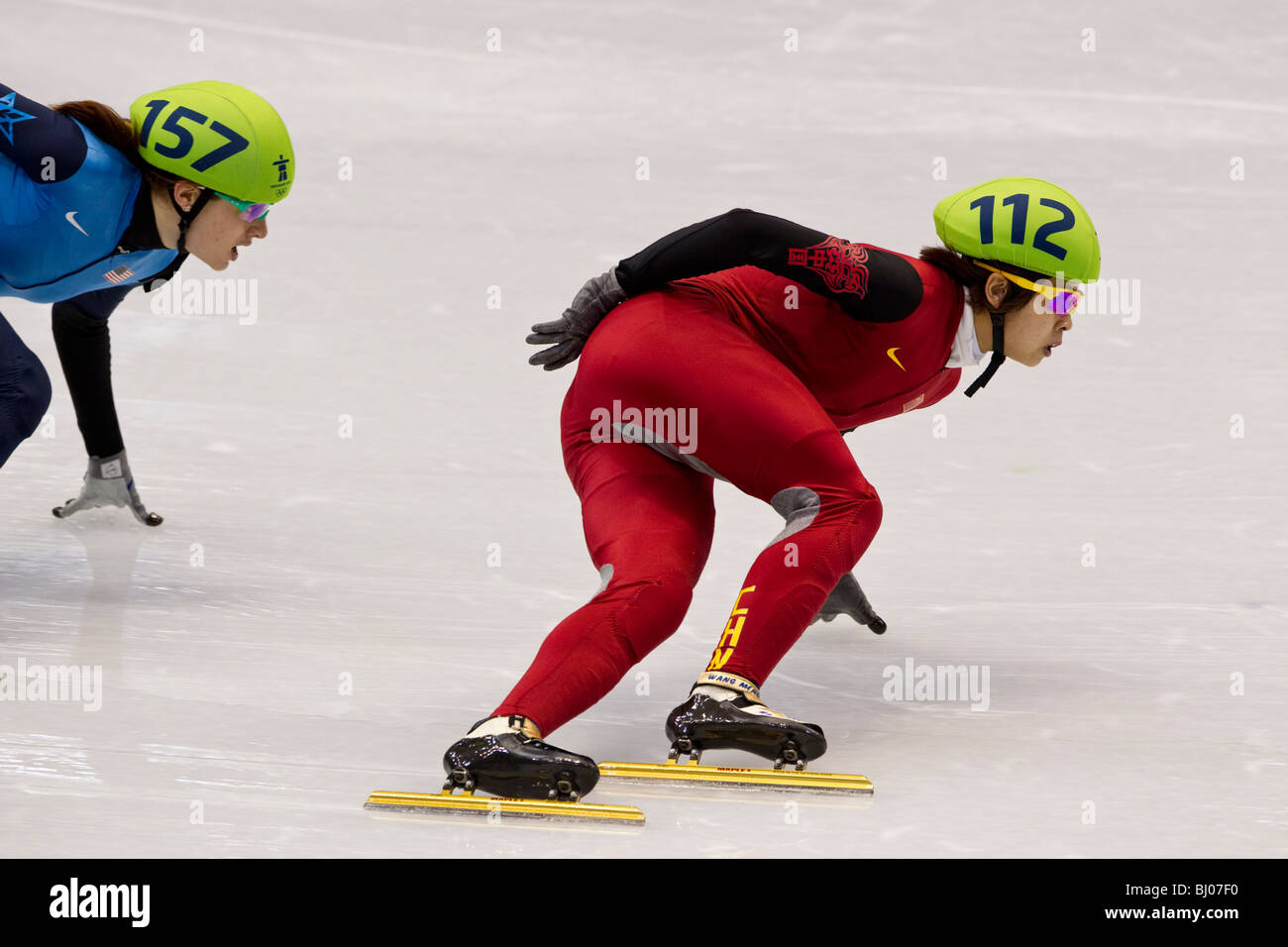 Wang Meng (CHN) competing in the Short Track Speed Skating Women's 1000m final event at the 2010 Olympic Winter Games Stock Photo