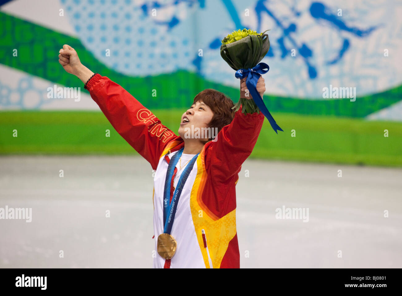 Wang Meng (CHN) reacts after receiving the gold medal in the Short Track Speed Skating Women's 1000m event at the 2010 Olympics Stock Photo