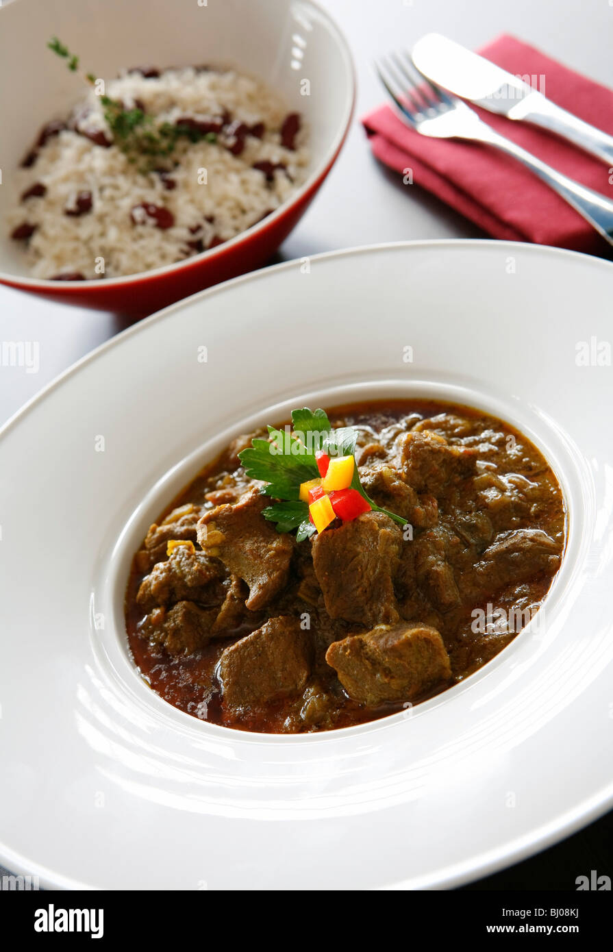 Beef Goulash served with rice and kidney beans Stock Photo Alamy