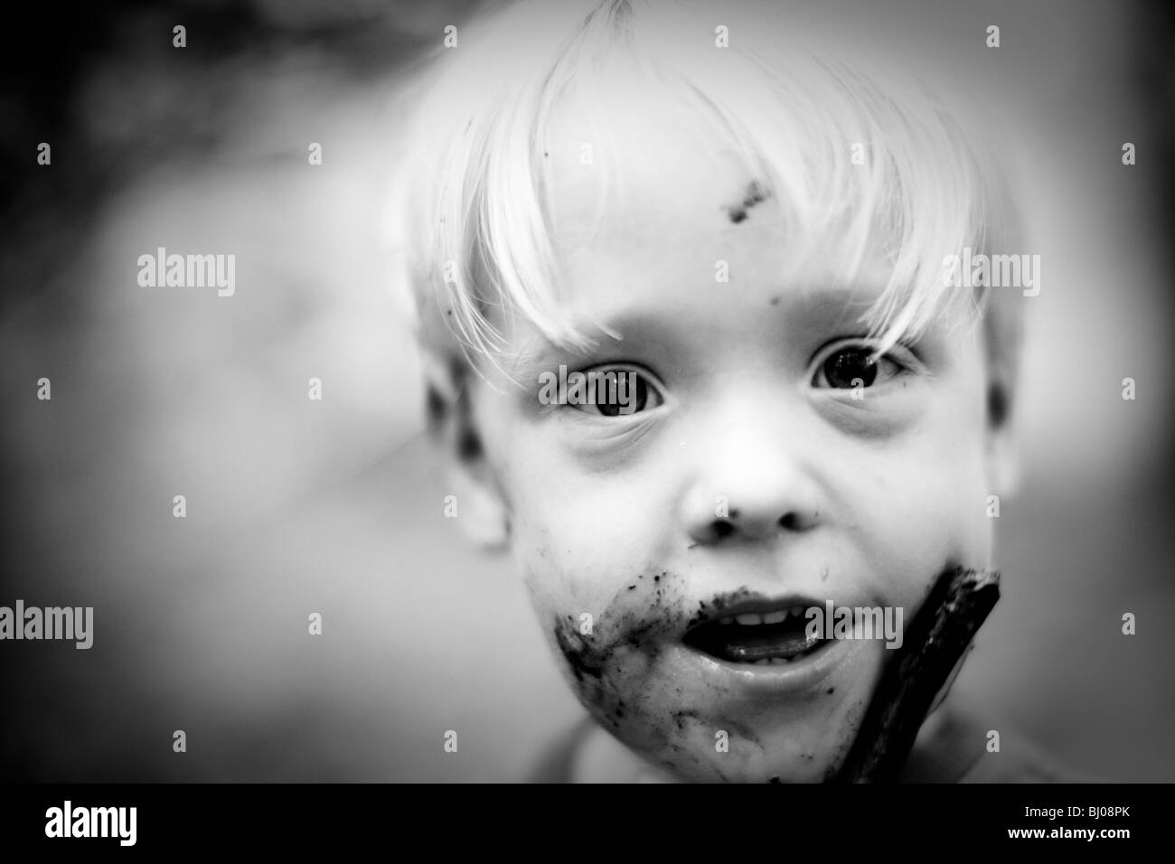 Boy with dirty face. Stock Photo