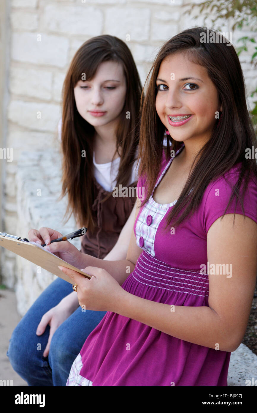 Student asking another student questions for a survey Stock Photo