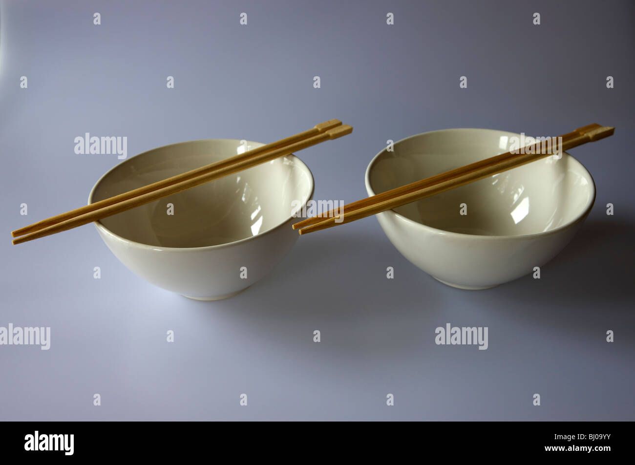 rice bowls with chopsticks Stock Photo Alamy