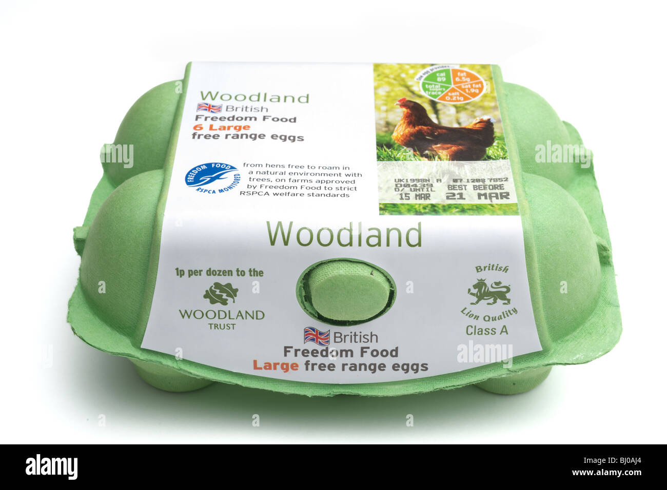 Egg box containing Six class A Woodland British free range eggs in a green polystyrene container Stock Photo