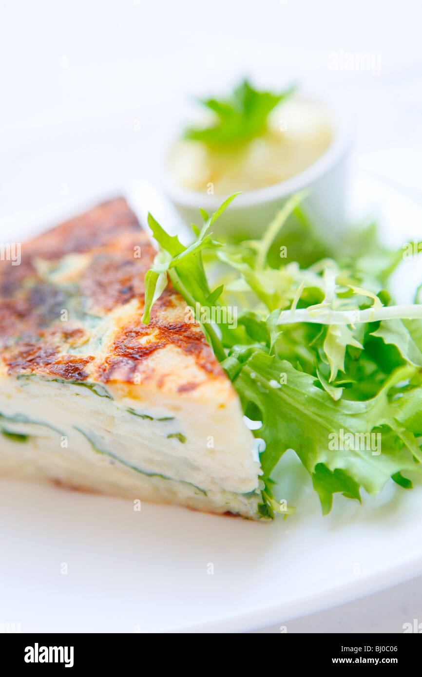 Quiche and salad served in th Ikon cafe, Brindleyplace, Birmingham, West Midlands, England Stock Photo