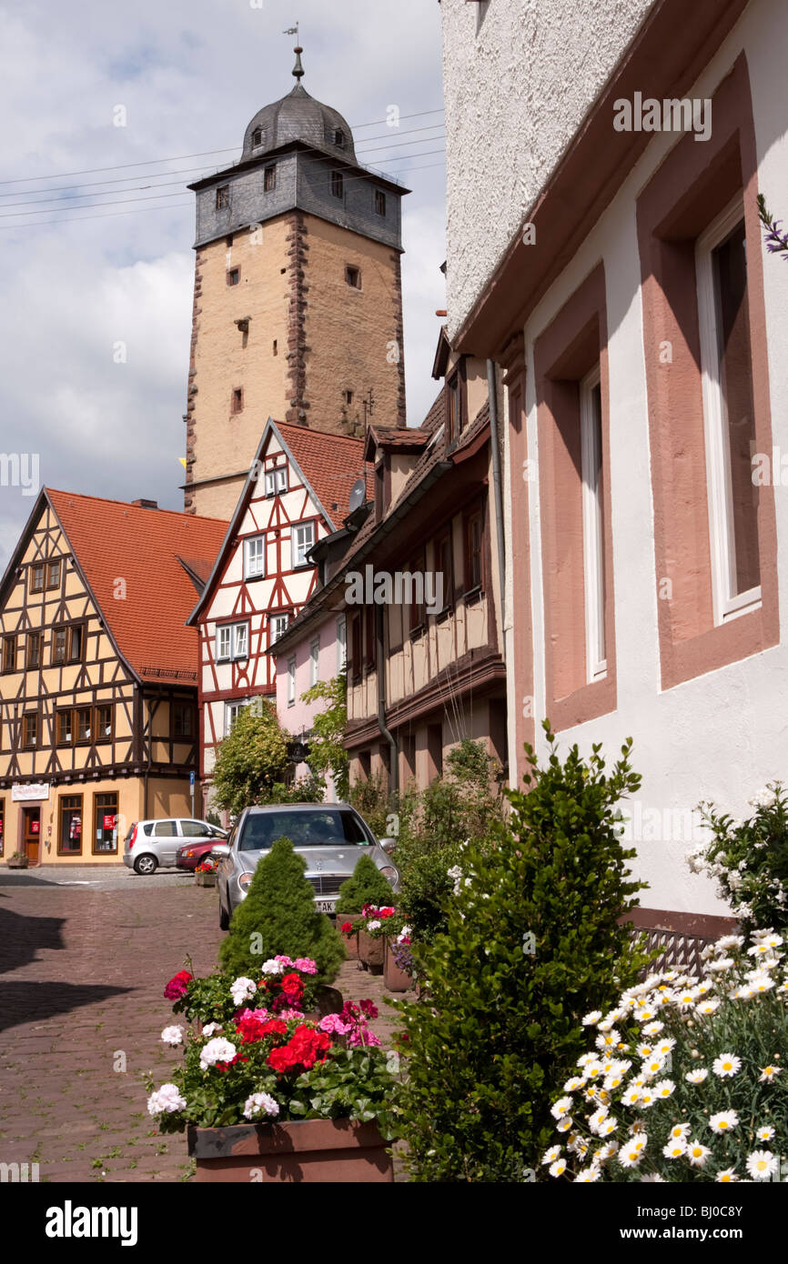 Street with buildings and tower, Lohr Am Main, Germany Stock Photo