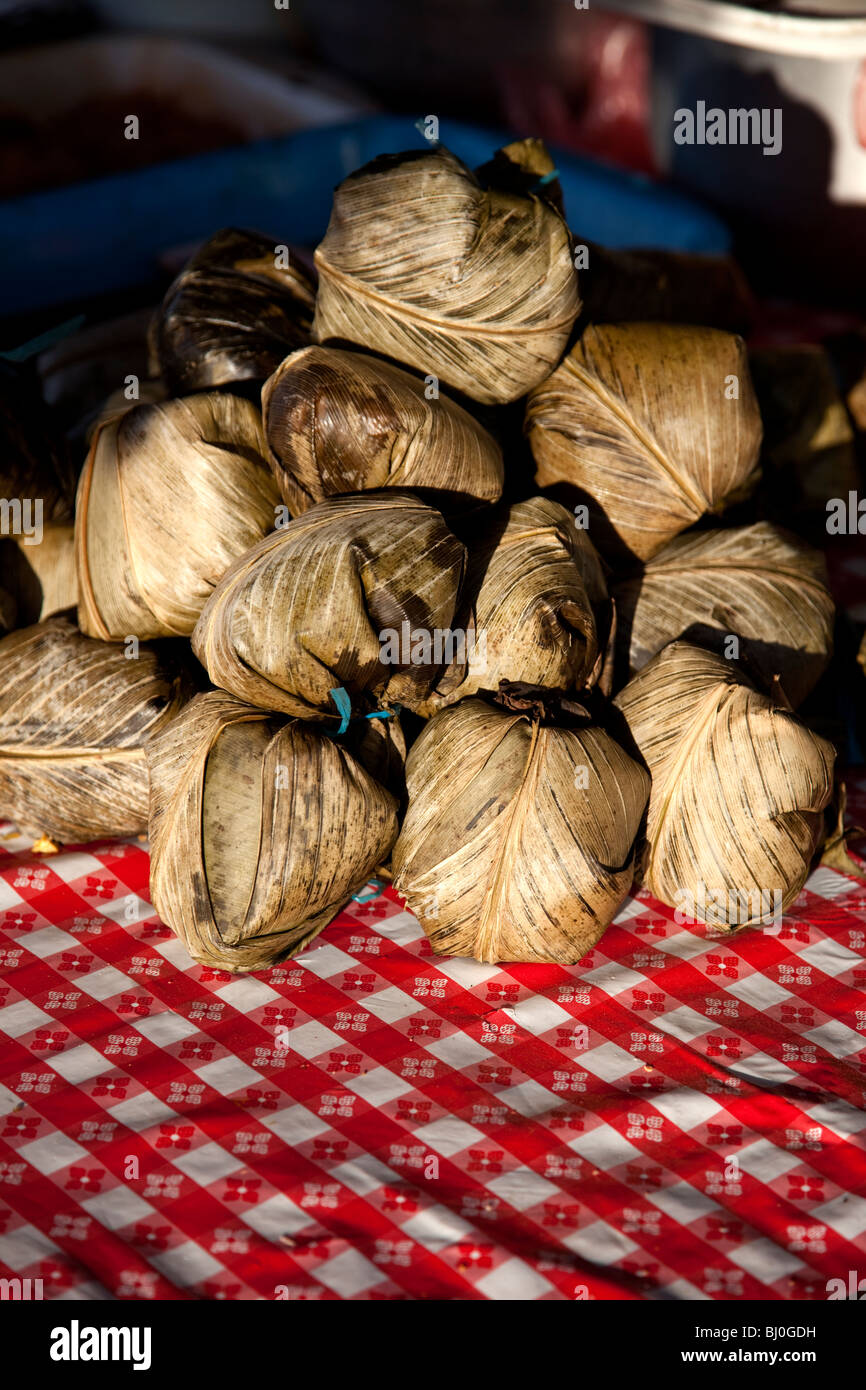 Juanes (rice, eggs, olives, herbs, and chicken steamed in a banana leaf