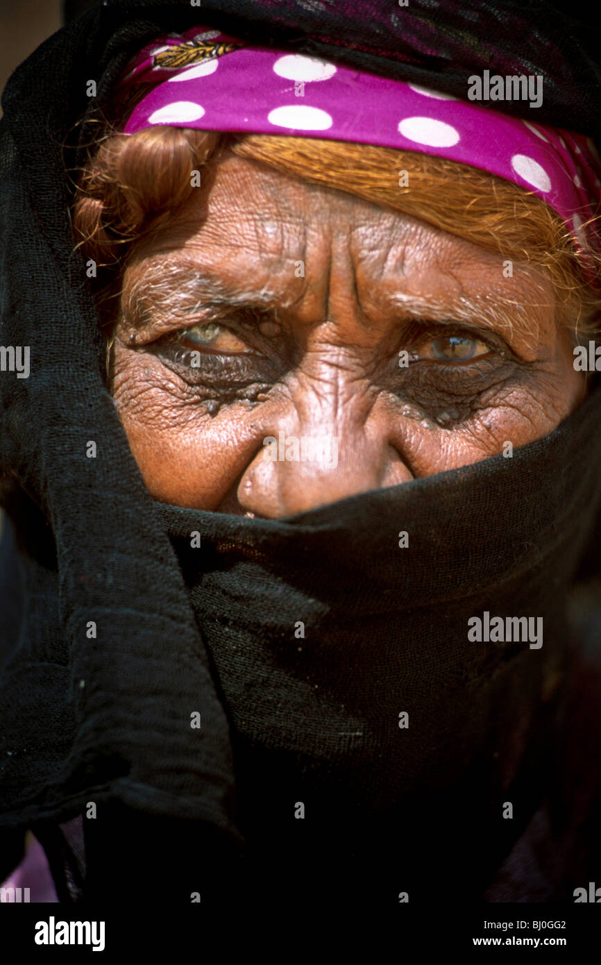 old Bedouin woman with cataract eyes wearing a scarf in Moses Springs, Suez Canal, Sinai Peninsula, Egypt, Africa Stock Photo