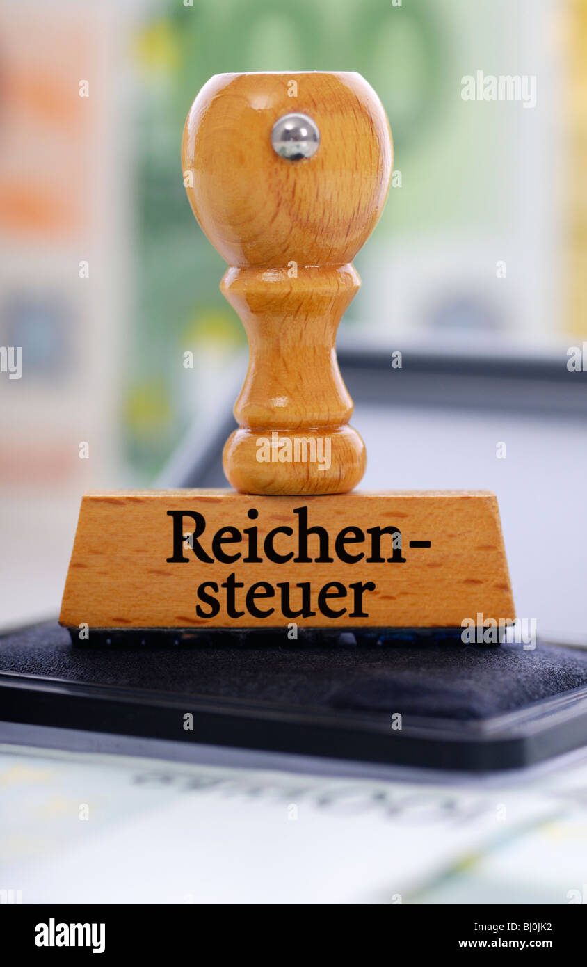 Stamp with the inscription wealth tax Stock Photo