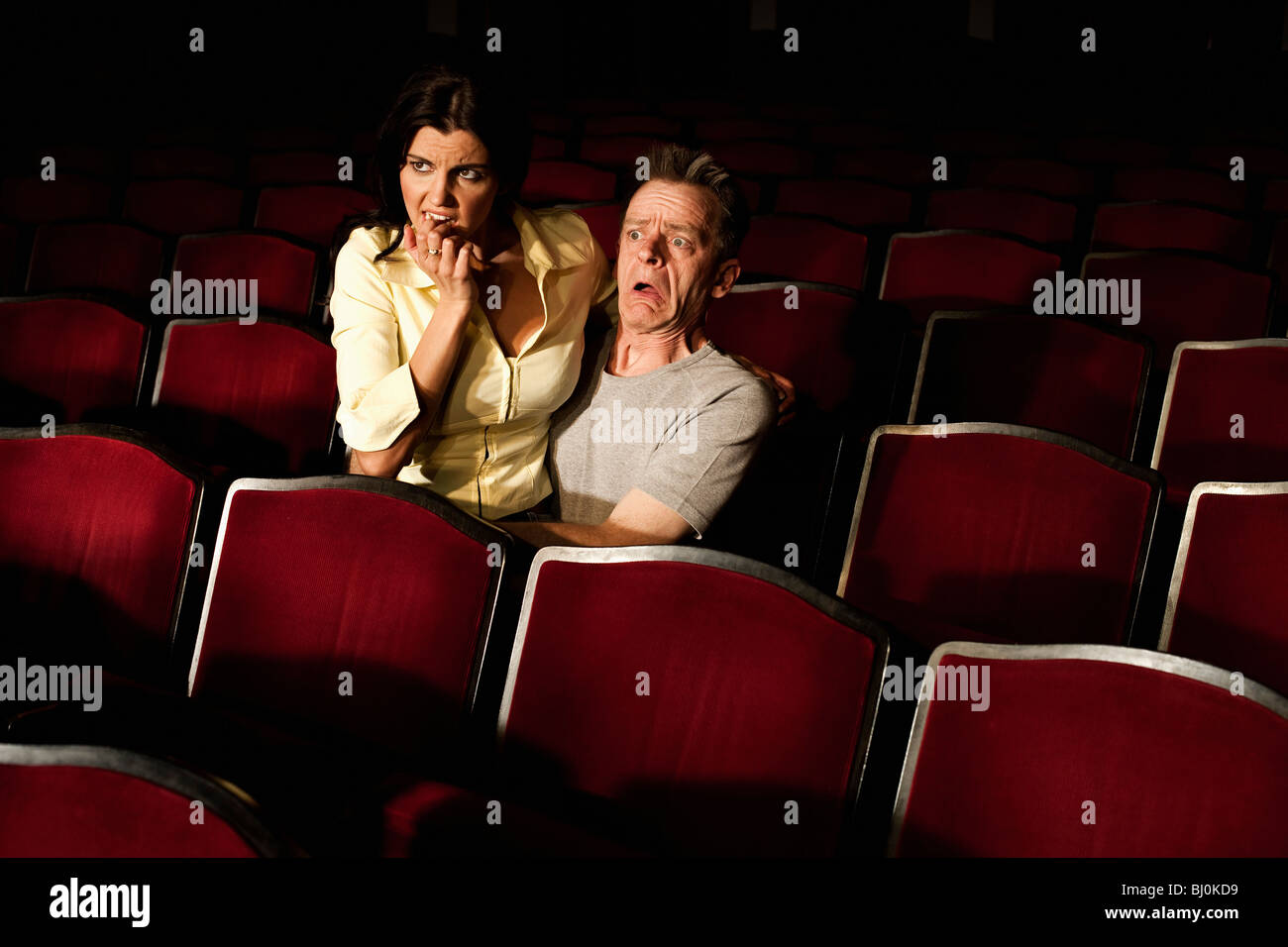 two spectators watching theatre play Stock Photo - Alamy