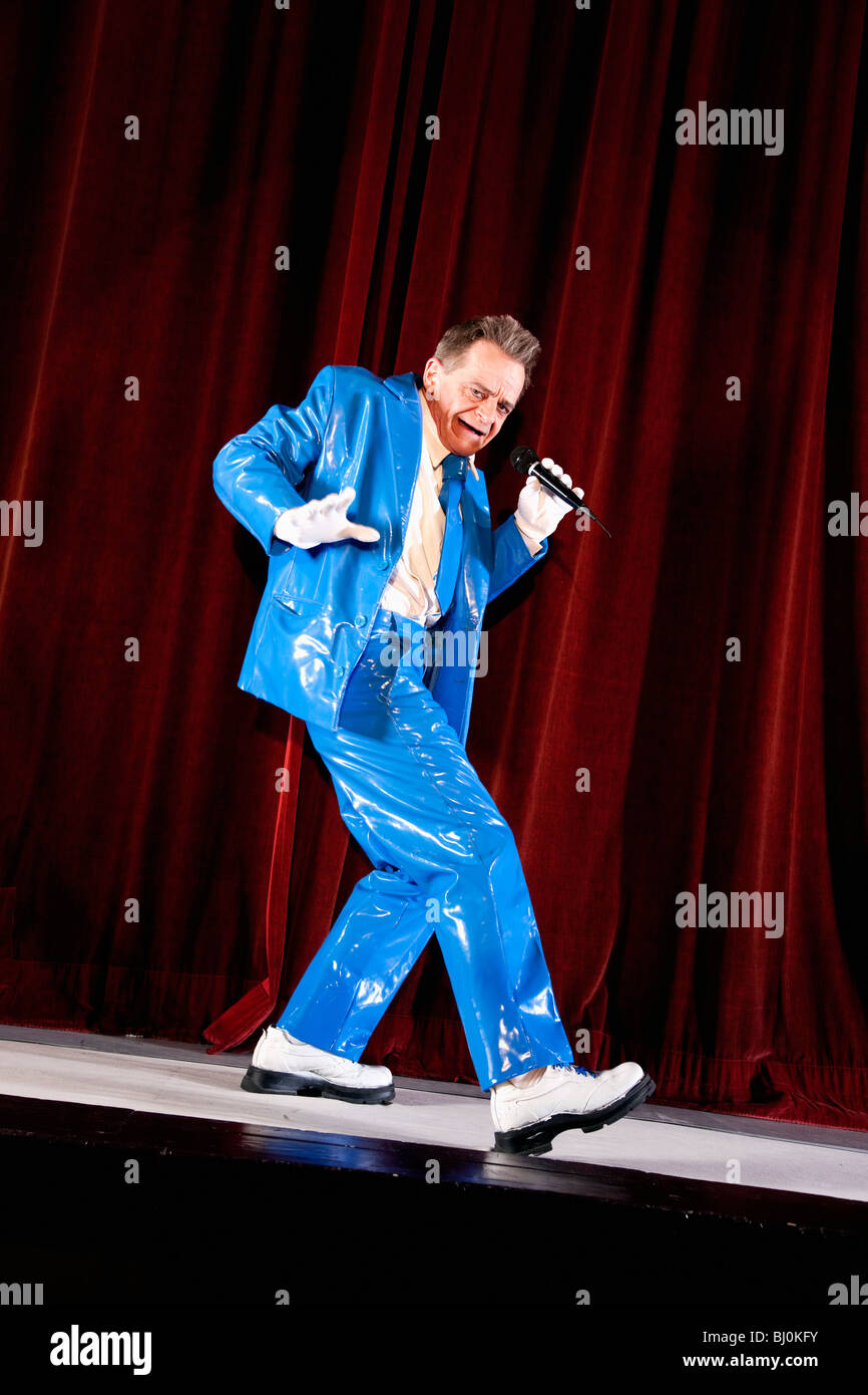 comedian performing on stage Stock Photo Alamy