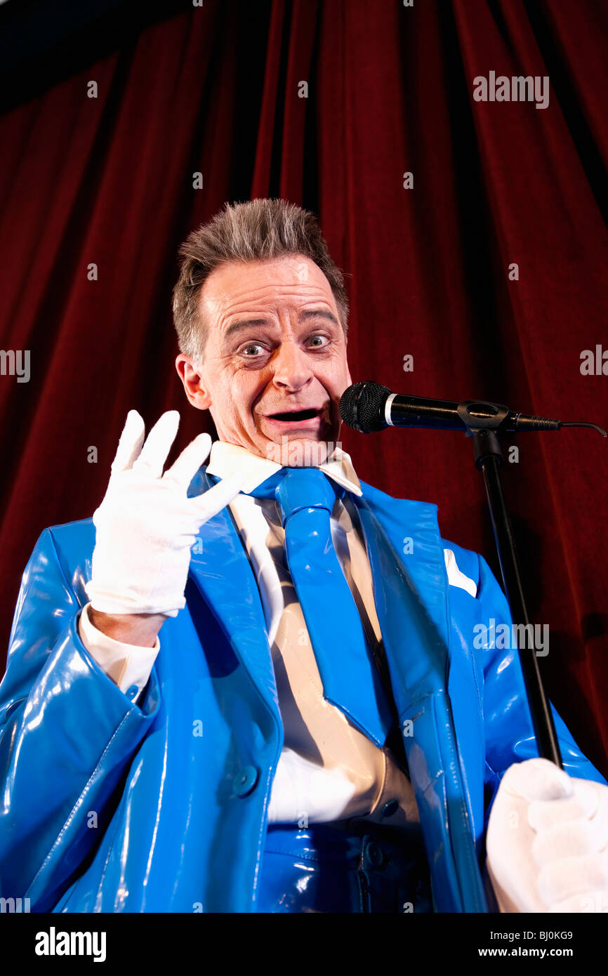 comedian performing on stage Stock Photo Alamy