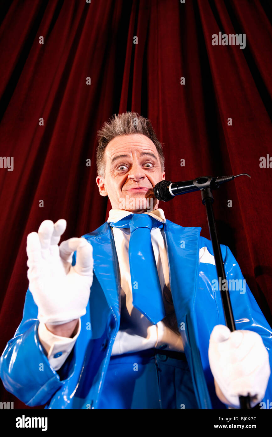 comedian performing on stage Stock Photo Alamy