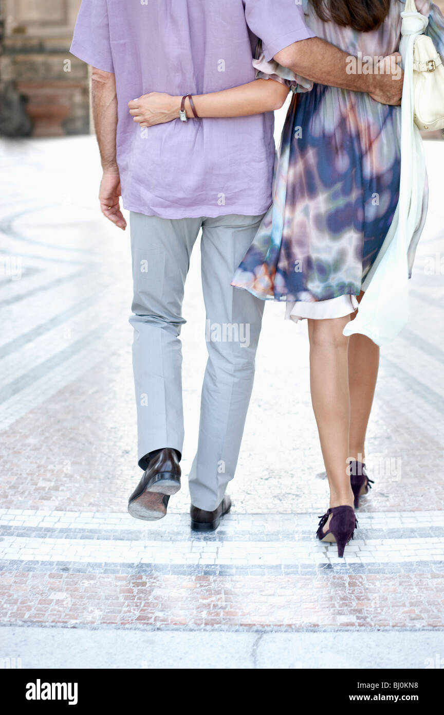 rear view of young couple walking Stock Photo
