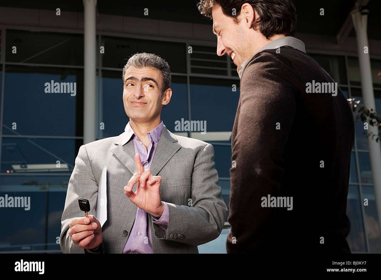 Car dealer giving key hi-res stock photography and images - Alamy