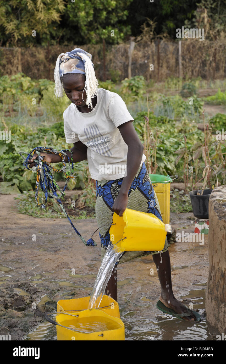 Woman drawing water from well hires stock photography and images Alamy