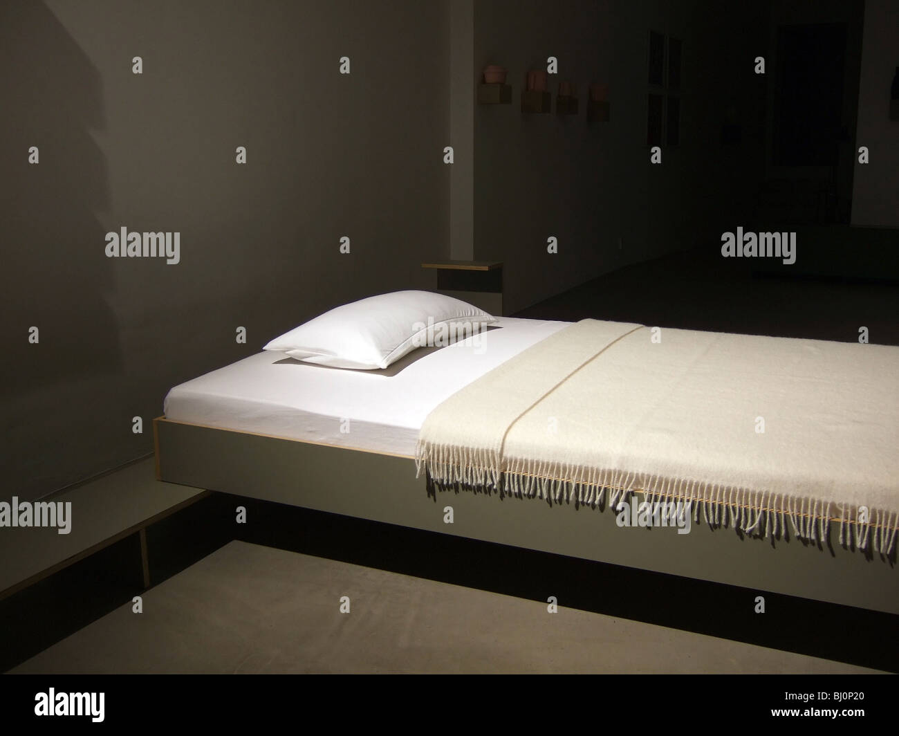Bed in a display window Stock Photo - Alamy