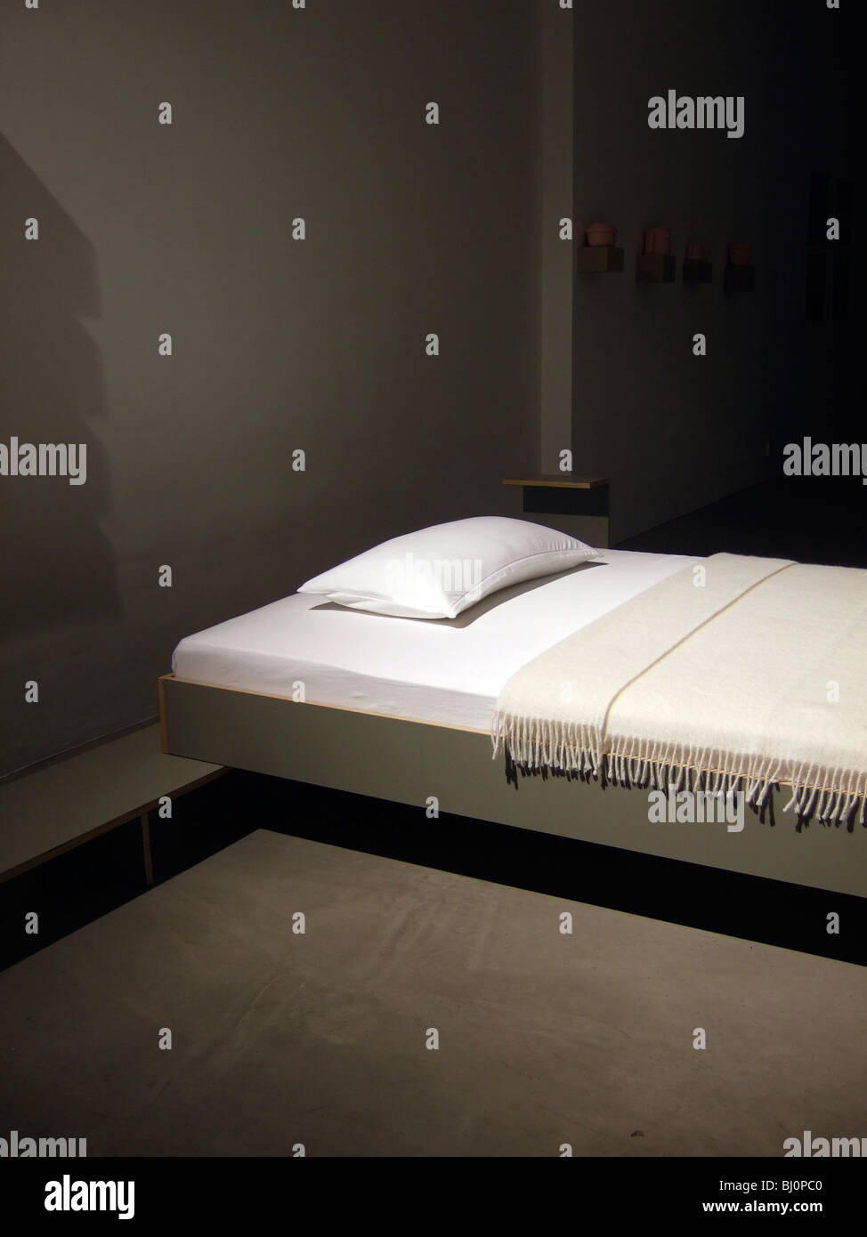 Bed in a display window Stock Photo - Alamy