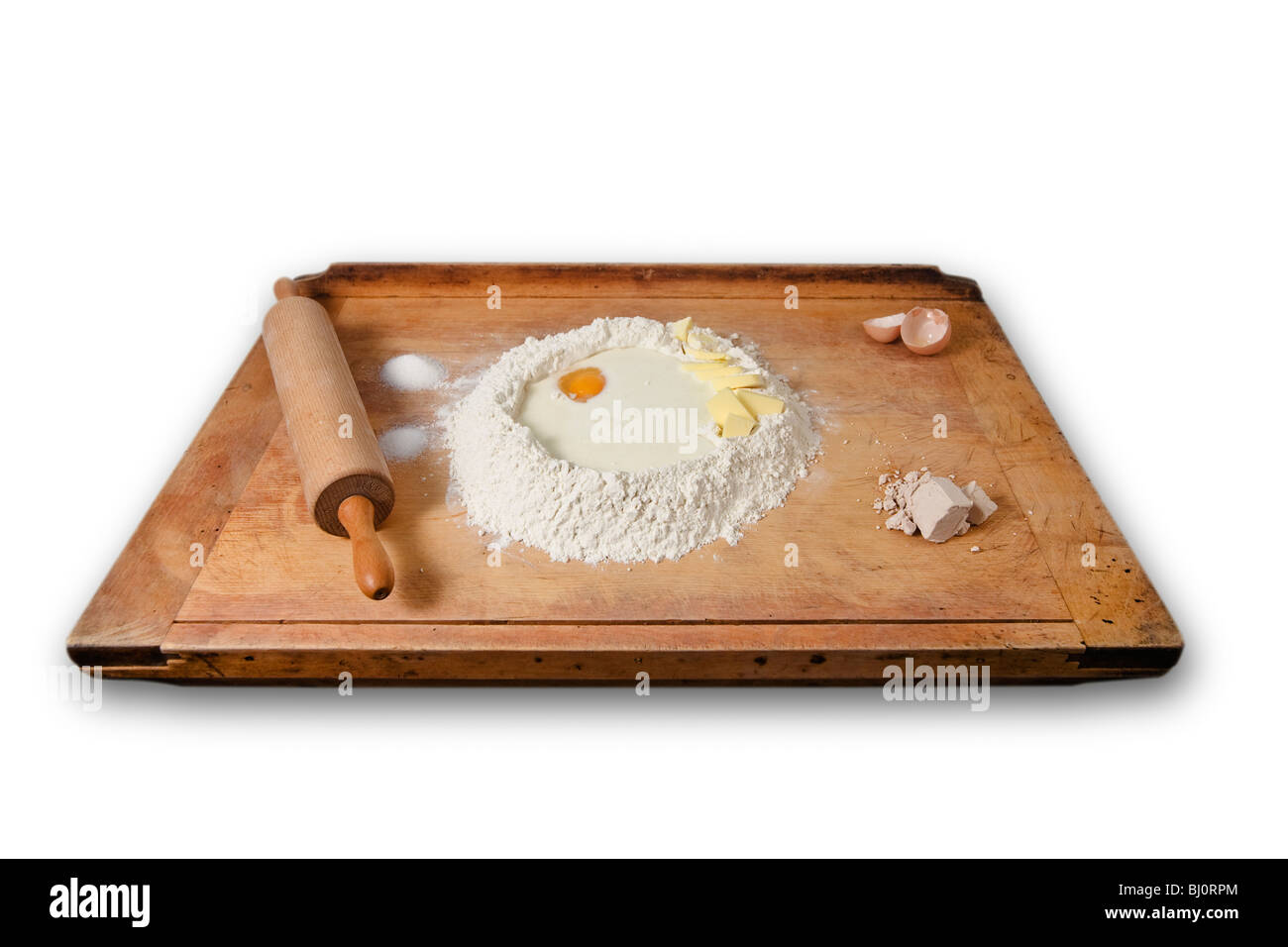 ingredients of a leavened dough on a breadboard Stock Photo