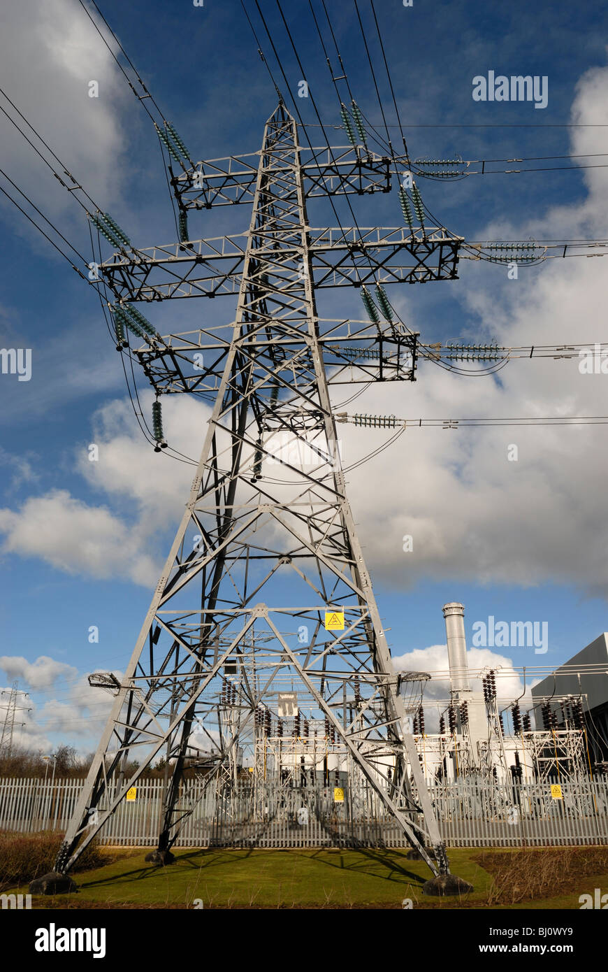 Overhead electricity power line pylon at the natural gas fired power station in Corby Northamptonshire Stock Photo