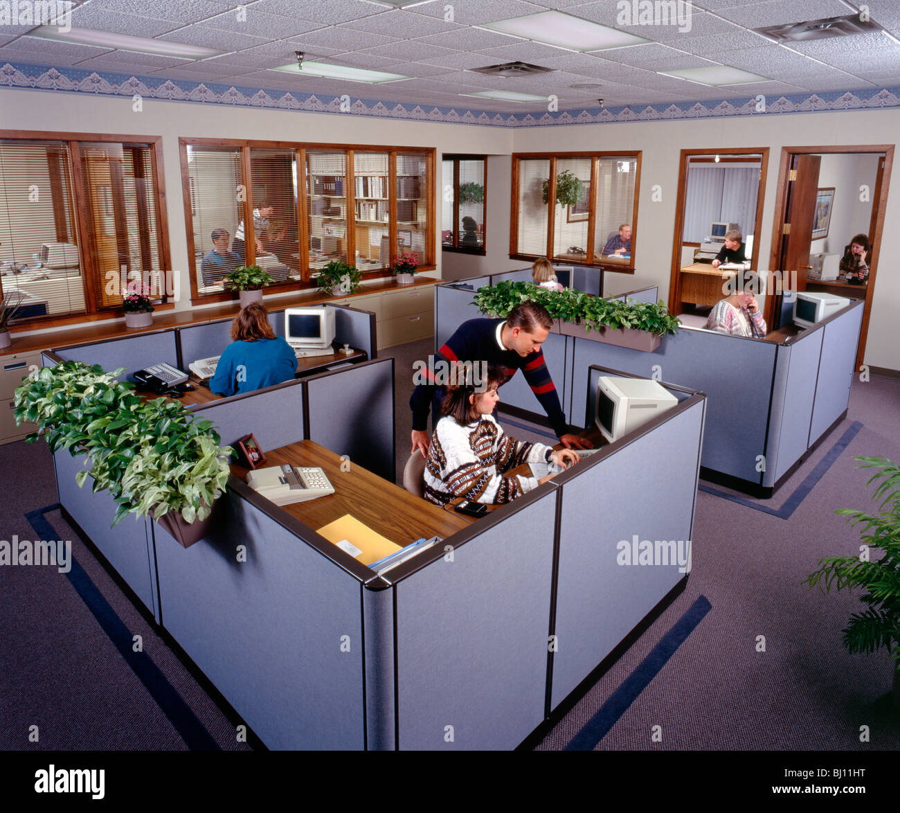 Corporate workers in the offices of a restaurant supply company Stock Photo