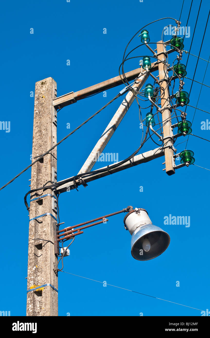 Old domestic mains electricity supply pole France Stock Photo Alamy
