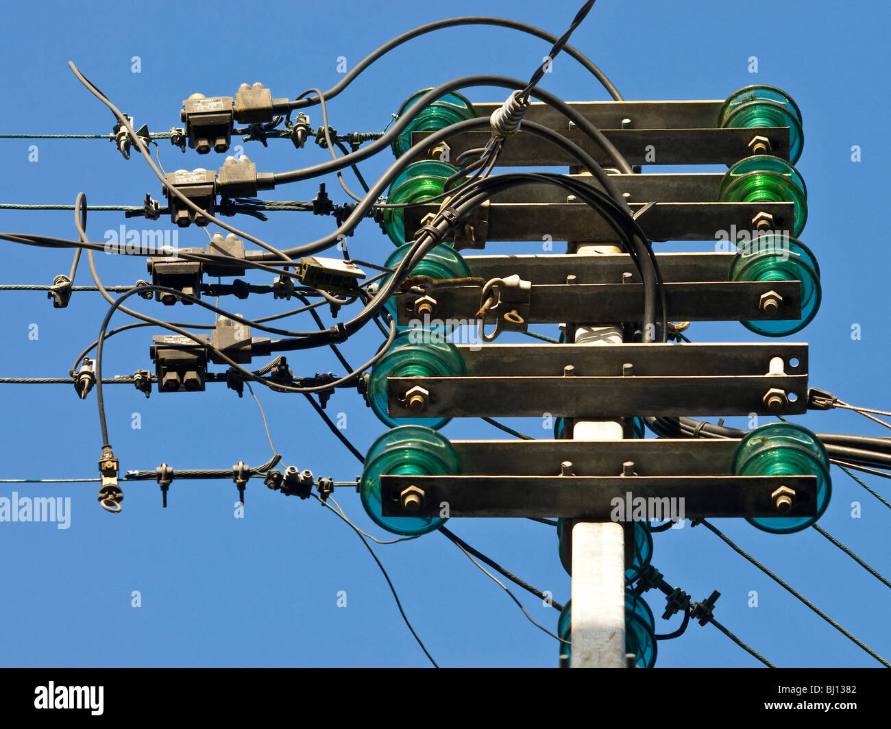 Old domestic mains electricity supply pole France Stock Photo Alamy