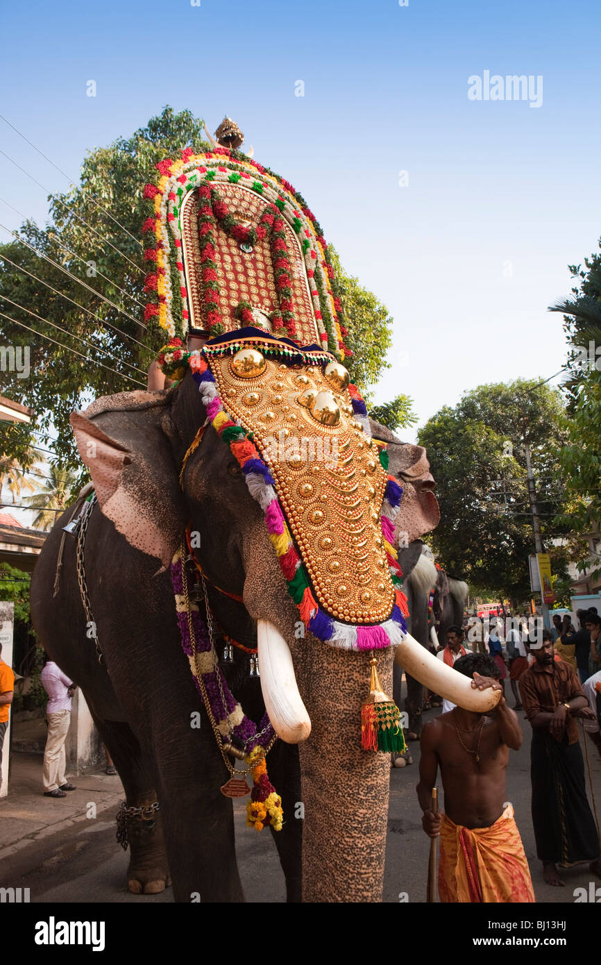 India, Kerala, Kochi, Ernakulam Uthsavom festival, Parayeduppu elephant procession caparisoned elephant with mahout Stock Photo