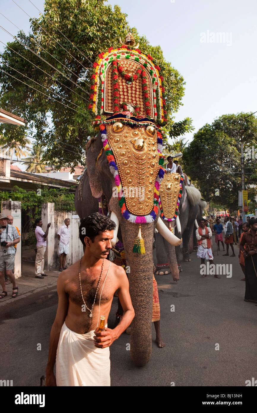 India, Kerala, Kochi, Ernakulam, Diwans Road, Uthsavom festival, priest leading Parayeduppu elephant procession Stock Photo