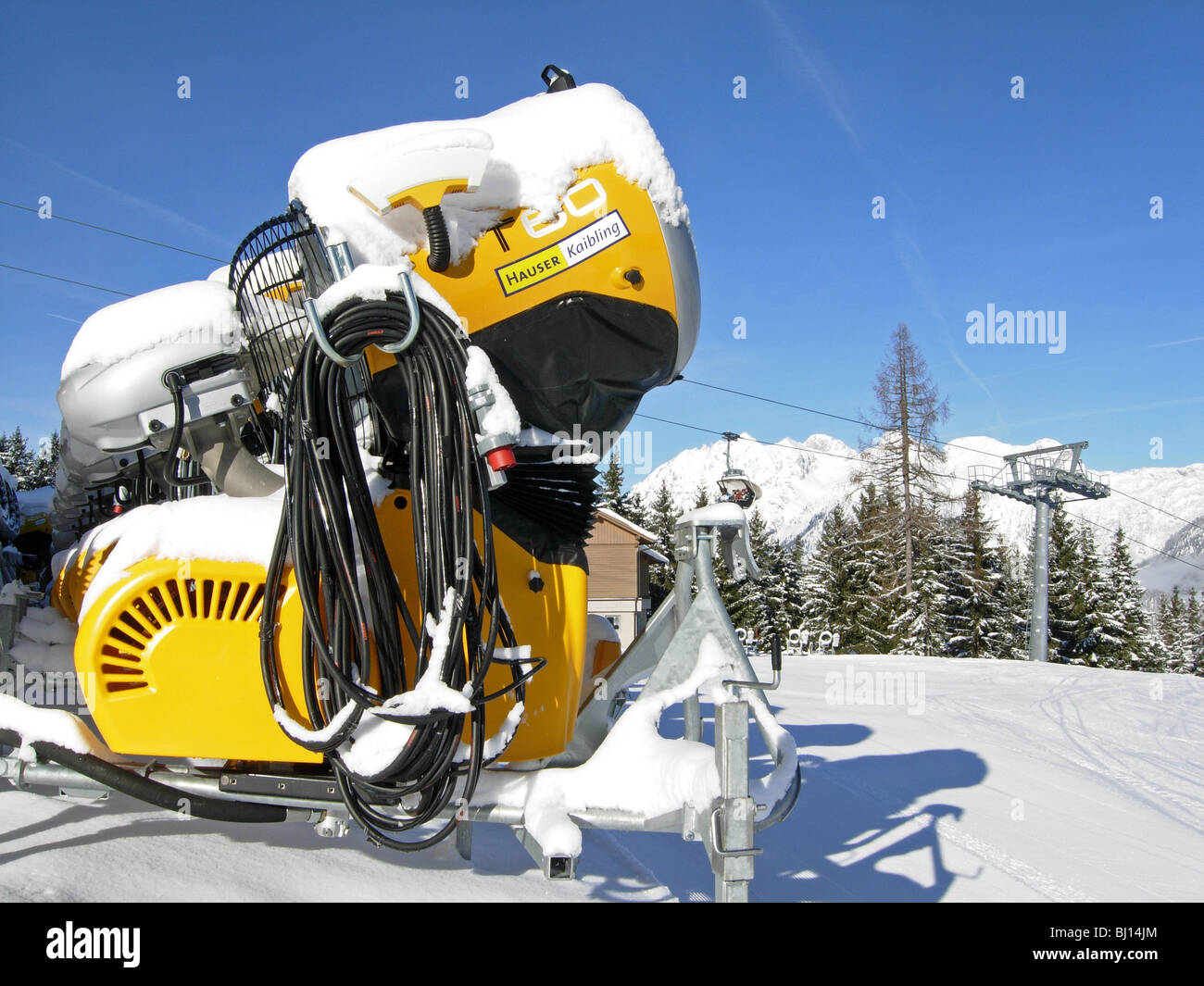 snow making equipment at Haus in Austria Stock Photo
