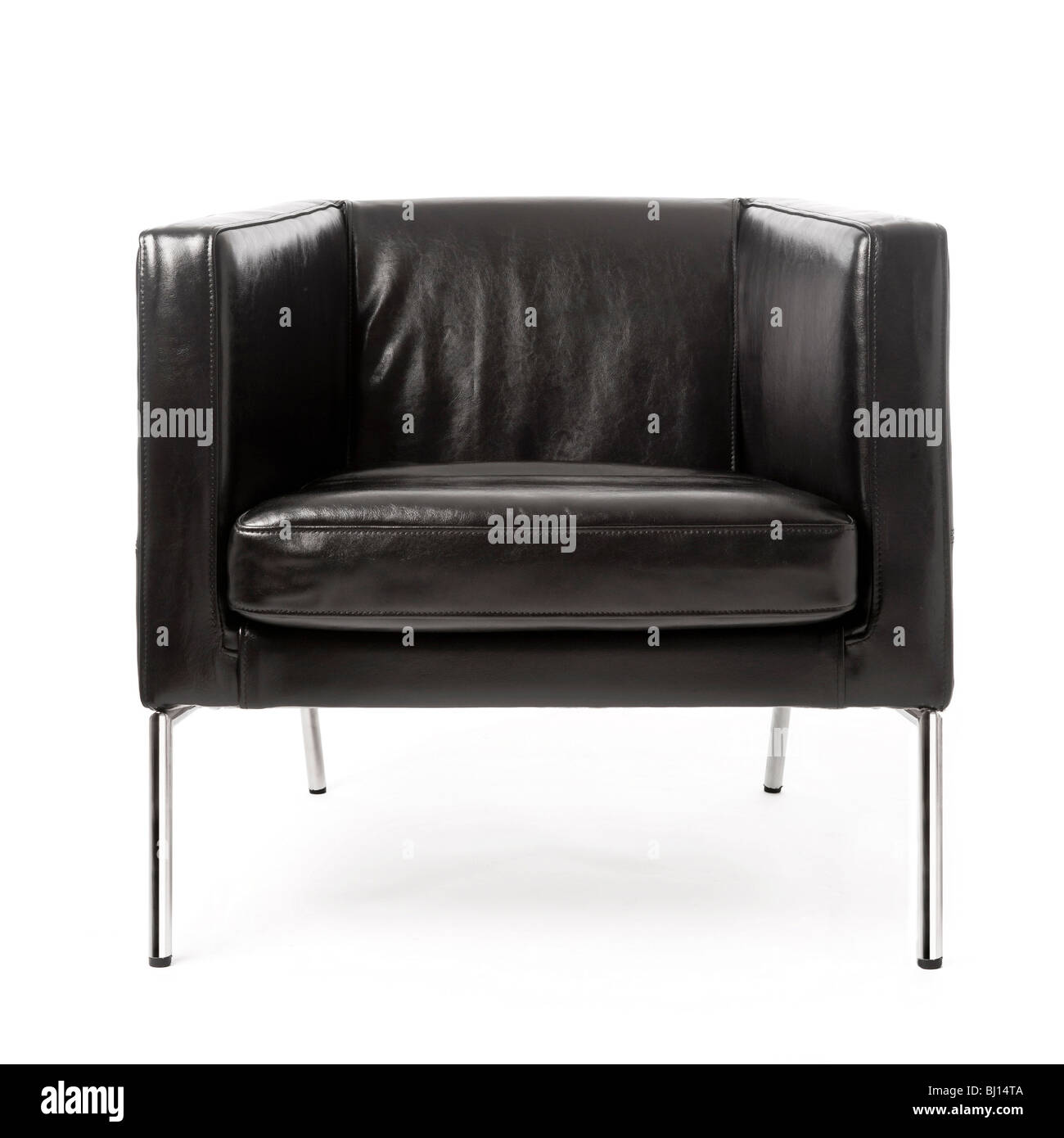 Studio shot of front view of modern black leather and chrome armchair on white background. Stock Photo