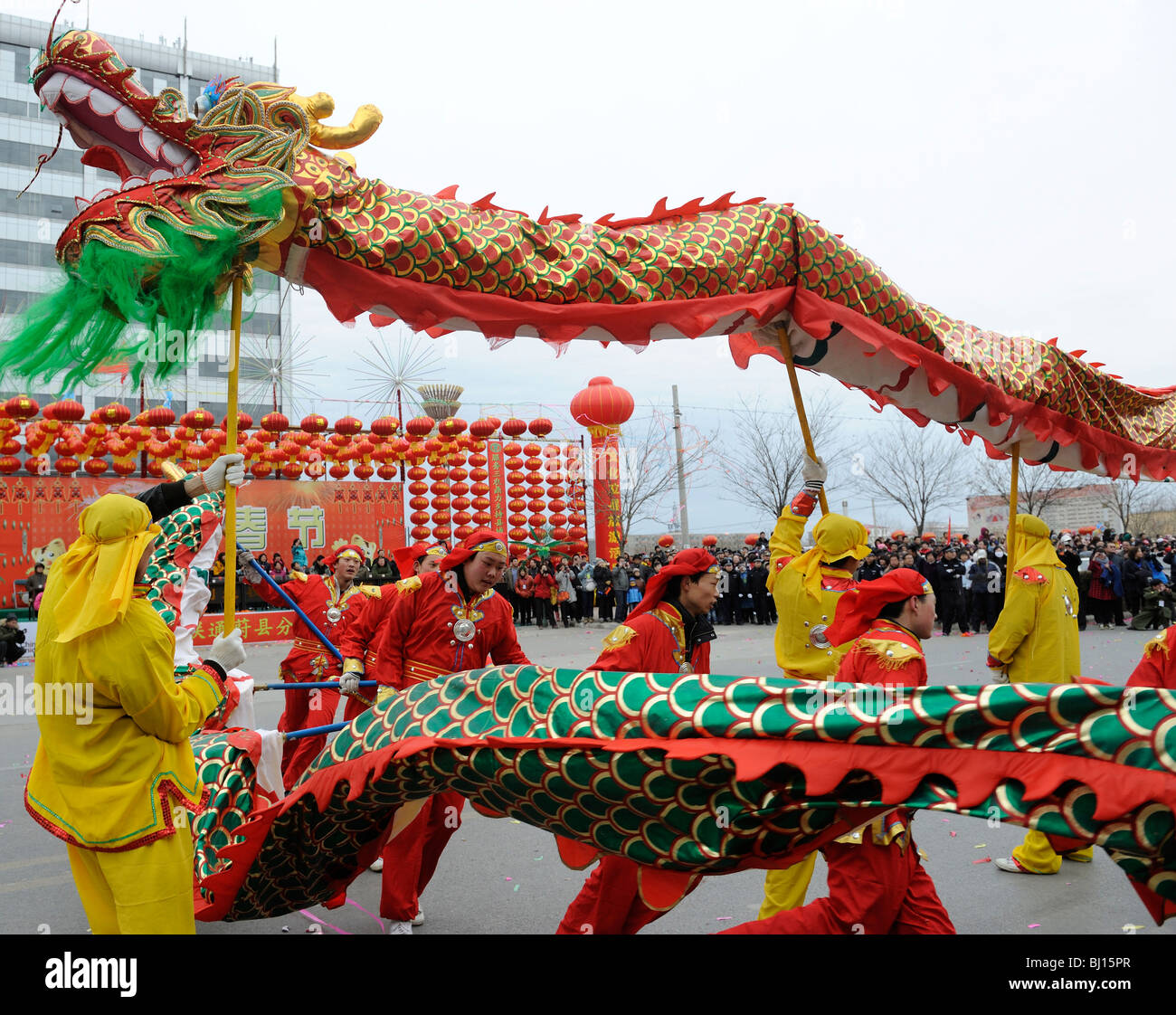 People perform traditonal dragon dancing during Yuanxiao Festival or the Lantern Festival in Yuxian, Hebei, China. 28-Feb-2010 Stock Photo