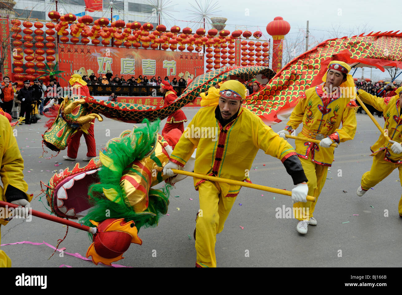 People perform traditonal dragon dancing during Yuanxiao Festival or the Lantern Festival in Yuxian, Hebei, China. 28-Feb-2010 Stock Photo