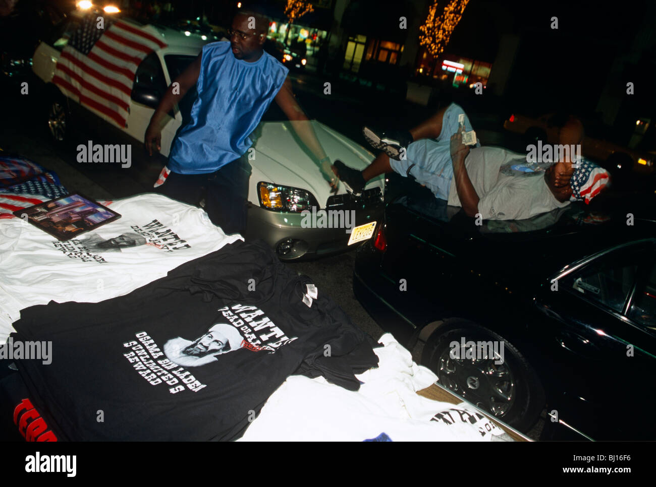 Osama bin Laden t-shirts are on sale at night in the streets of Manhattan, only days after the attacks on New York's twin towers Stock Photo