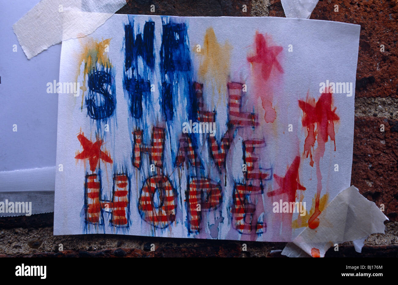 Rain streaked poster offering optimistic sense of unity to Americans after 9/11 attacks on New York. Stock Photo