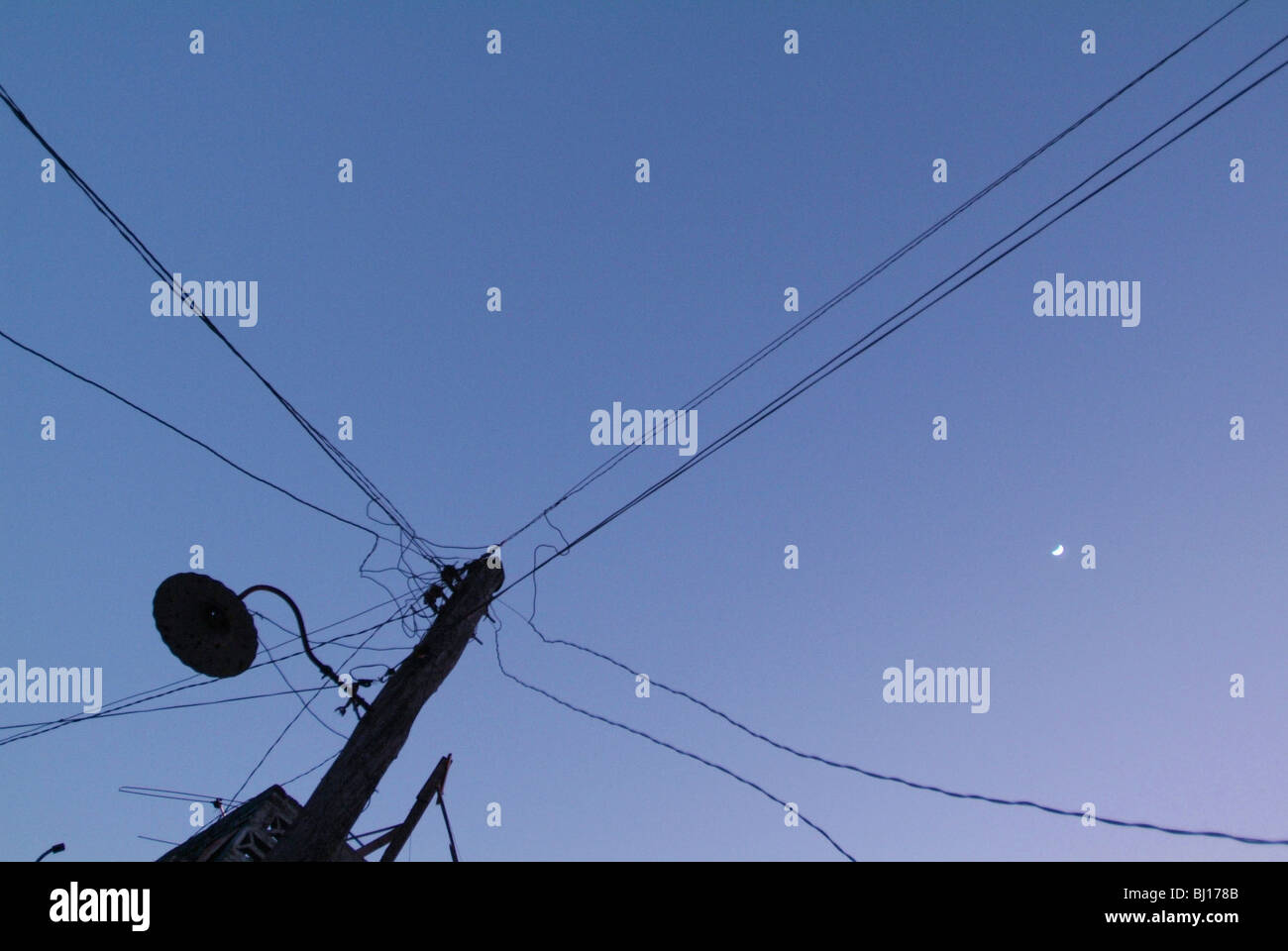 An electric pole against blue sky Stock Photo - Alamy