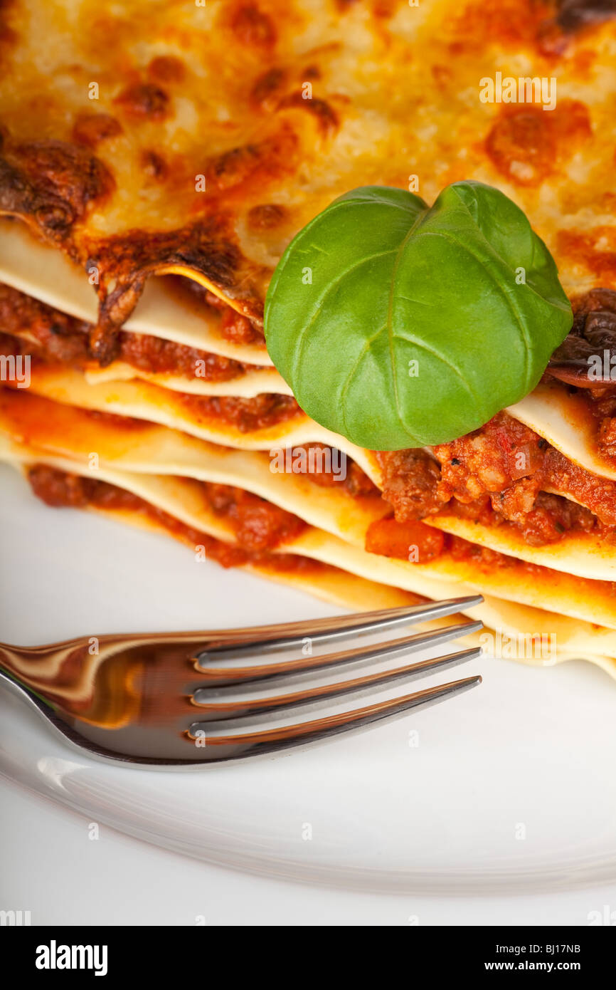 lasagna noodle dish on a white plate Stock Photo