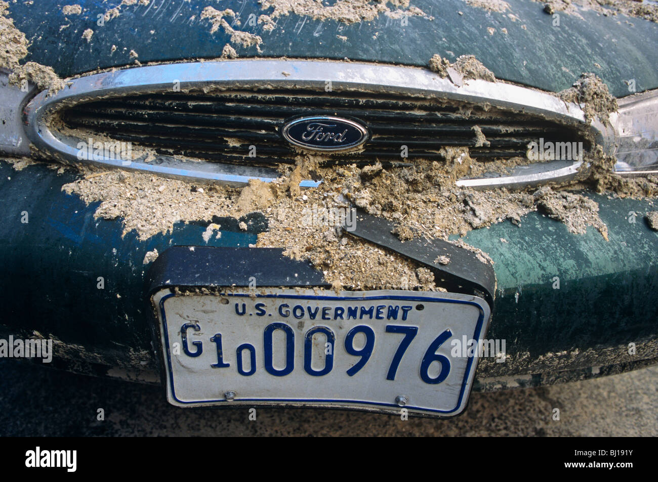 Front grill and bonnet (hood) paintwork of a parked damaged US Government Ford car near Ground Zero after 9/11 attacks Stock Photo