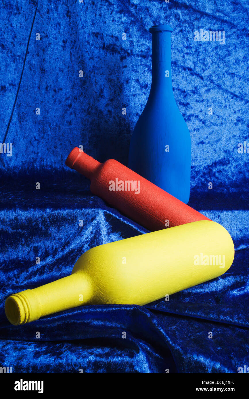 Bottles in primary colours. Stock Photo